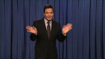 An animated image of Jimmy Fallon scurrying off stage, waving his hands innocently.